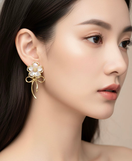 The "Etoile Bloom Bow" Drop Earrings