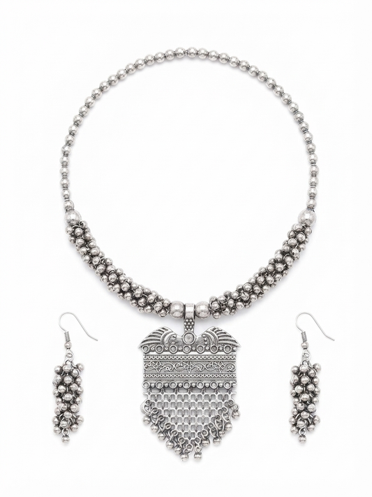 Umakriti Oxidized Silver Tribal Charm Necklace Set