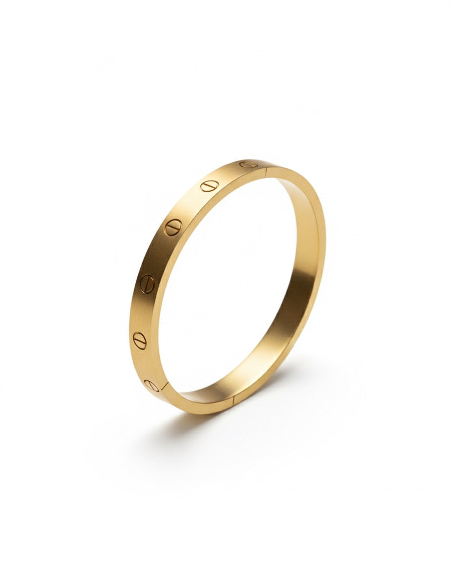 Iconic gold bangle